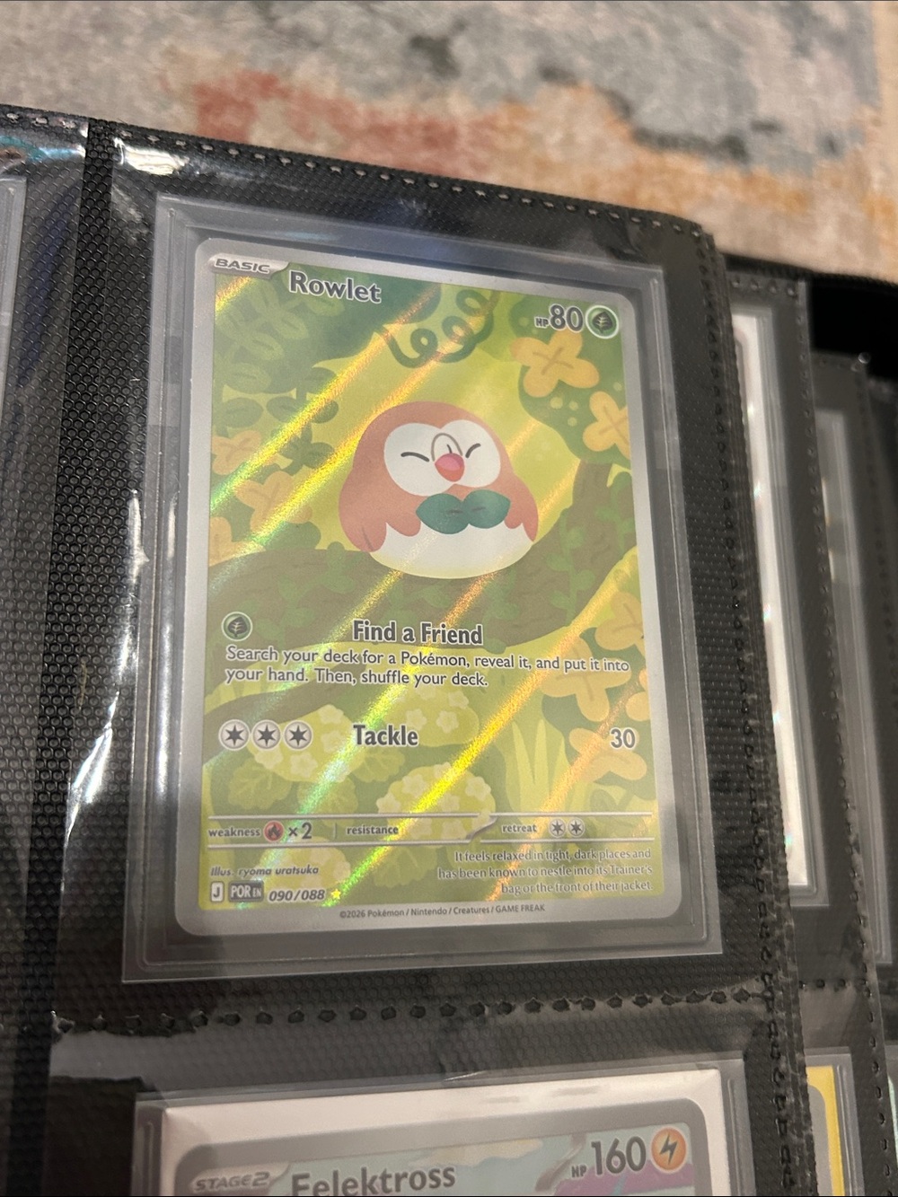 Pokemon Rowlet Holographic Green and Yellow Card